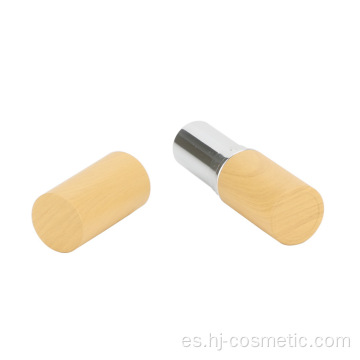 Tubo de lápiz labial amarillo claro grano de madera redondo suave vacío de cosméticos